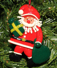 Load image into Gallery viewer, KURT ADLER VINTAGE 1990&#39;s CLAY DOUGH SANTA CLAUS HOLDING GIFT CHRISTMAS ORNAMENT
